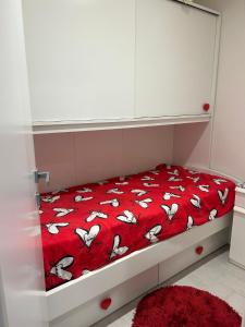 Tempat tidur dalam kamar di Casa vacanze da Mely