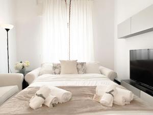[Suite in Nervi] porticciolo - Stazione10' - WiFi tesisinde bir odada yatak veya yataklar