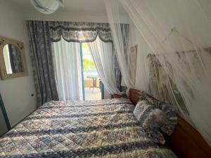 Ένα ή περισσότερα κρεβάτια σε δωμάτιο στο Smaragdi Apartment