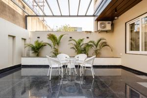 Μια τηλεόραση ή/και κέντρο ψυχαγωγίας στο Lime Tree B&B Pari Chowk