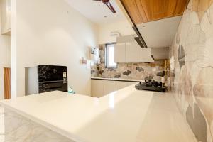 Kuchyň nebo kuchyňský kout v ubytování Lime Tree B&B Pari Chowk