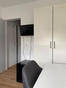 Postel nebo postele na pokoji v ubytování Haus Bielefeld Zimmer 30a