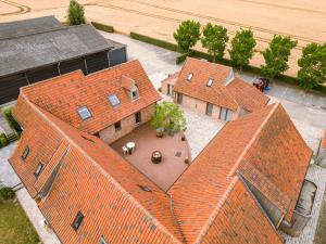 an overhead view of a large brick building at Charming Roger's Farm in Kortrijk