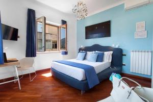 Ένα ή περισσότερα κρεβάτια σε δωμάτιο στο Alpa Suite