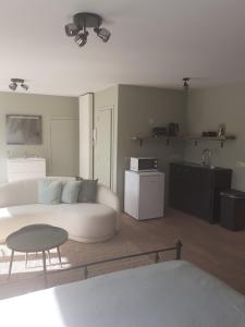 Kuchyň nebo kuchyňský kout v ubytování Home Away