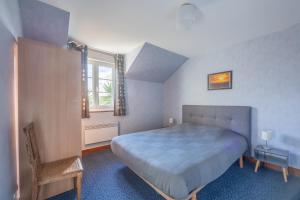 Postel nebo postele na pokoji v ubytování Gîte Les Petites Landes - Piscine privée proche plages + 12 fotografií