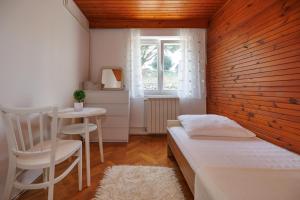 Postel nebo postele na pokoji v ubytování Apartments Hana