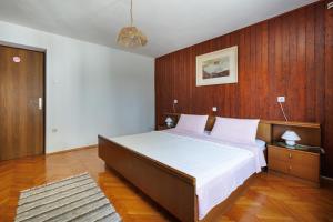 Postel nebo postele na pokoji v ubytování Apartments Hana