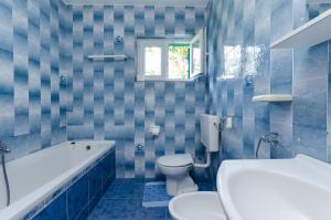 Ванная комната в Apartments Zdenka +37 фотографий