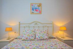 Postel nebo postele na pokoji v ubytování LITORAL COSTA DORADA - LAS CUMBRES Only families + 32 fotografií