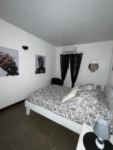 Voodi või voodid majutusasutuse TIANOLI lodge grand confort avec vue magnifique toas
