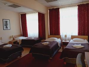 Cama ou camas em um quarto em SCSK Żurawia