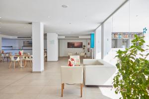 Posezení v ubytování Hotel Ilusion Calma & Spa