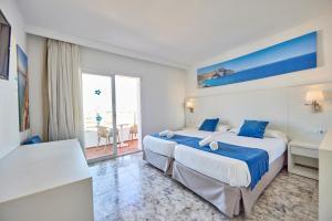 Postel nebo postele na pokoji v ubytování Hotel Ilusion Calma & Spa