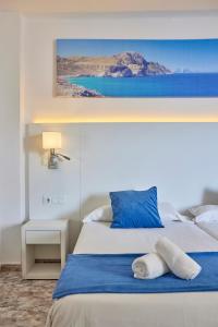 Postel nebo postele na pokoji v ubytování Hotel Ilusion Calma & Spa