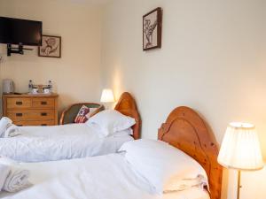 Postel nebo postele na pokoji v ubytování Horton Inn
