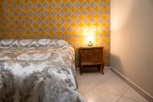 Rúm í herbergi á Casa Luca - Siti storici e ottima cucina locale