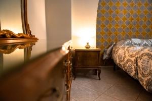 Rúm í herbergi á Casa Luca - Siti storici e ottima cucina locale