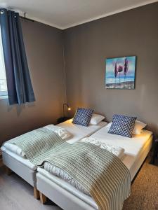 Postel nebo postele na pokoji v ubytování Apartment Isfjordsveien