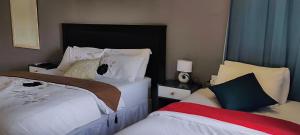 Tempat tidur dalam kamar di Hilton Bed & Breakfast