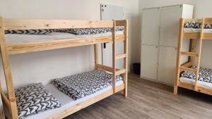 Postel nebo postele na pokoji v ubytování A Plus Hostel - Centrum