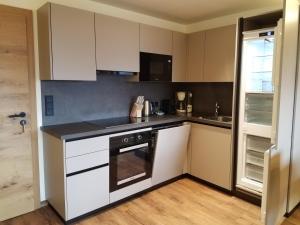 Dapur atau dapur kecil di Aparthotel Hohe Brücke