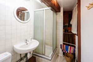 a bathroom with a sink and a shower at Grand Chalet Vanoise - 12 pers in Saint-André