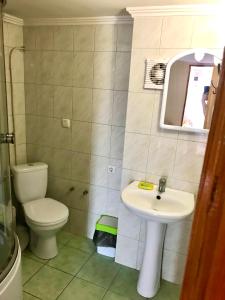 Ein Badezimmer in der Unterkunft Квартира