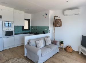 A kitchen or kitchenette at Hostal Sa Malica