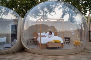 Postel nebo postele na pokoji v ubytování Bubble Room Suite Experience - Bolla Savio Ravenna