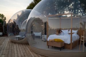 Postel nebo postele na pokoji v ubytování Bubble Room Suite Experience - Bolla Savio Ravenna