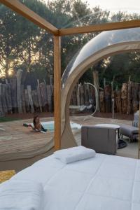 Postel nebo postele na pokoji v ubytování Bubble Room Suite Experience - Bolla Savio Ravenna