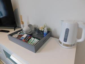 a table with a blender on top of a counter at Bed and breakfast near Truro and the A30 in Truro