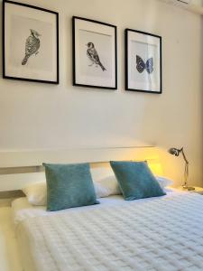 A bed or beds in a room at ComeCasa 2 bedrooms Apartment in via Curtatone