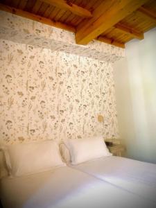Postel nebo postele na pokoji v ubytování Hostal As Margaritas