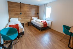 Stracta Hotel客房内的一张或多张床位