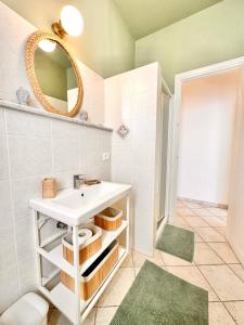 Et badeværelse på Hostdomus - Sea and Sand Suite