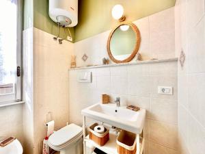 Et badeværelse på Hostdomus - Sea and Sand Suite + 18 billeder