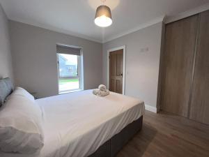 Voodi või voodid majutusasutuse New Atherny Home overlooking The fields of Athenry toas