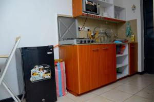 Virtuvė arba virtuvėlė apgyvendinimo įstaigoje Tsavo 90 degrees