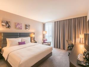 Cama ou camas em um quarto em Hilton Garden Inn Frankfurt City Centre