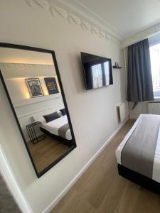 Letto o letti in una camera di Beaux ARTS