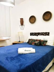 Voodi või voodid majutusasutuse Maravilhoso Studio Em Copacabana toas