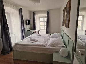 Postelja oz. postelje v sobi nastanitve Hotel Celerin