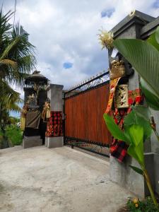 Zahrada ubytování Tamiu Guesthouse at Desa Wisata Keramas Near Keramas Surf Beach