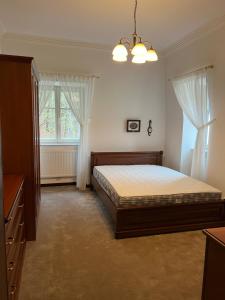 Postel nebo postele na pokoji v ubytování Apartment Villa Dionysus