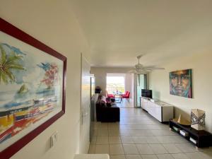 Predel za sedenje v nastanitvi Appartement Bougainvillier Martinique avec vue incroyable
