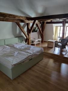 Postelja oz. postelje v sobi nastanitve Hotel Celerin