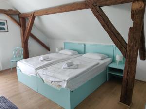 Postelja oz. postelje v sobi nastanitve Hotel Celerin