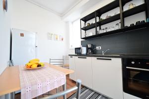 Kuchyň nebo kuchyňský kout v ubytování Penthouse 25